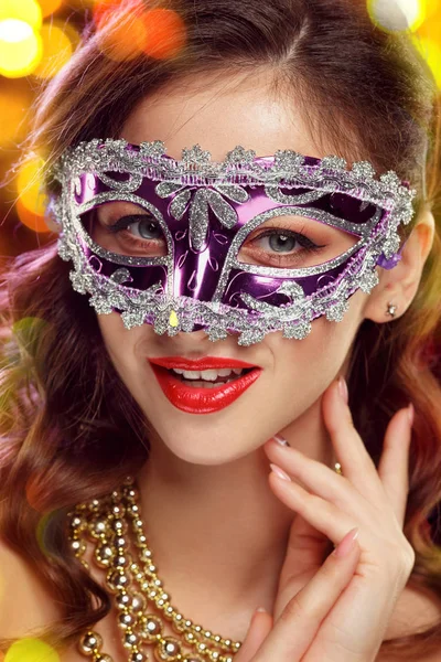 Beauty model woman wearing venetian masquerade carnival mask at party — Stock Photo, Image