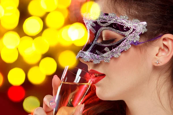 Beauty model woman wearing venetian masquerade carnival mask at party — Stock Photo, Image