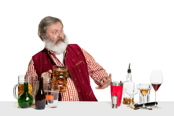 Expert barman with beer at studio — Stock Photo, Image