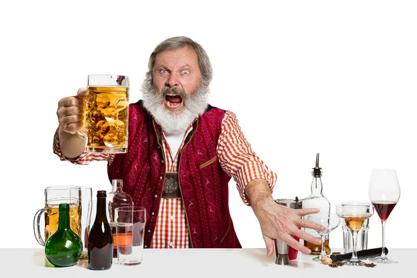 Expert barman with beer at studio — Stock Photo, Image