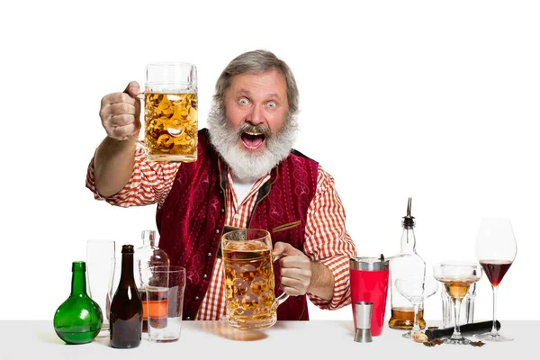 Expert barman with beer at studio — Stock Photo, Image