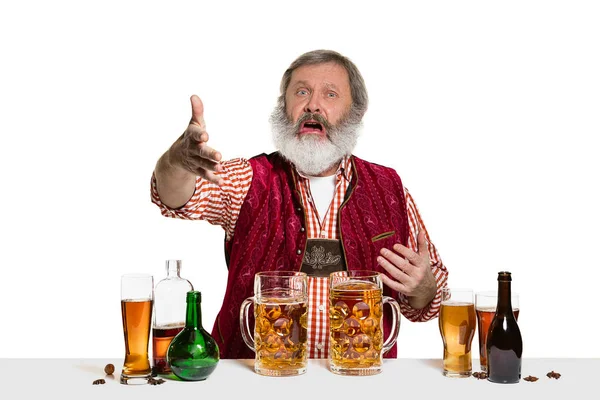 Expert barman with beer at studio — Stock Photo, Image