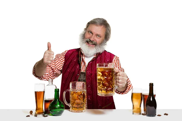 Expert barman with beer at studio — Stock Photo, Image