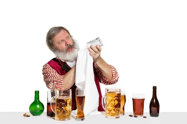 Expert barman with beer at studio — Stock Photo, Image