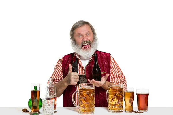 Expert barman with beer at studio — Stock Photo, Image