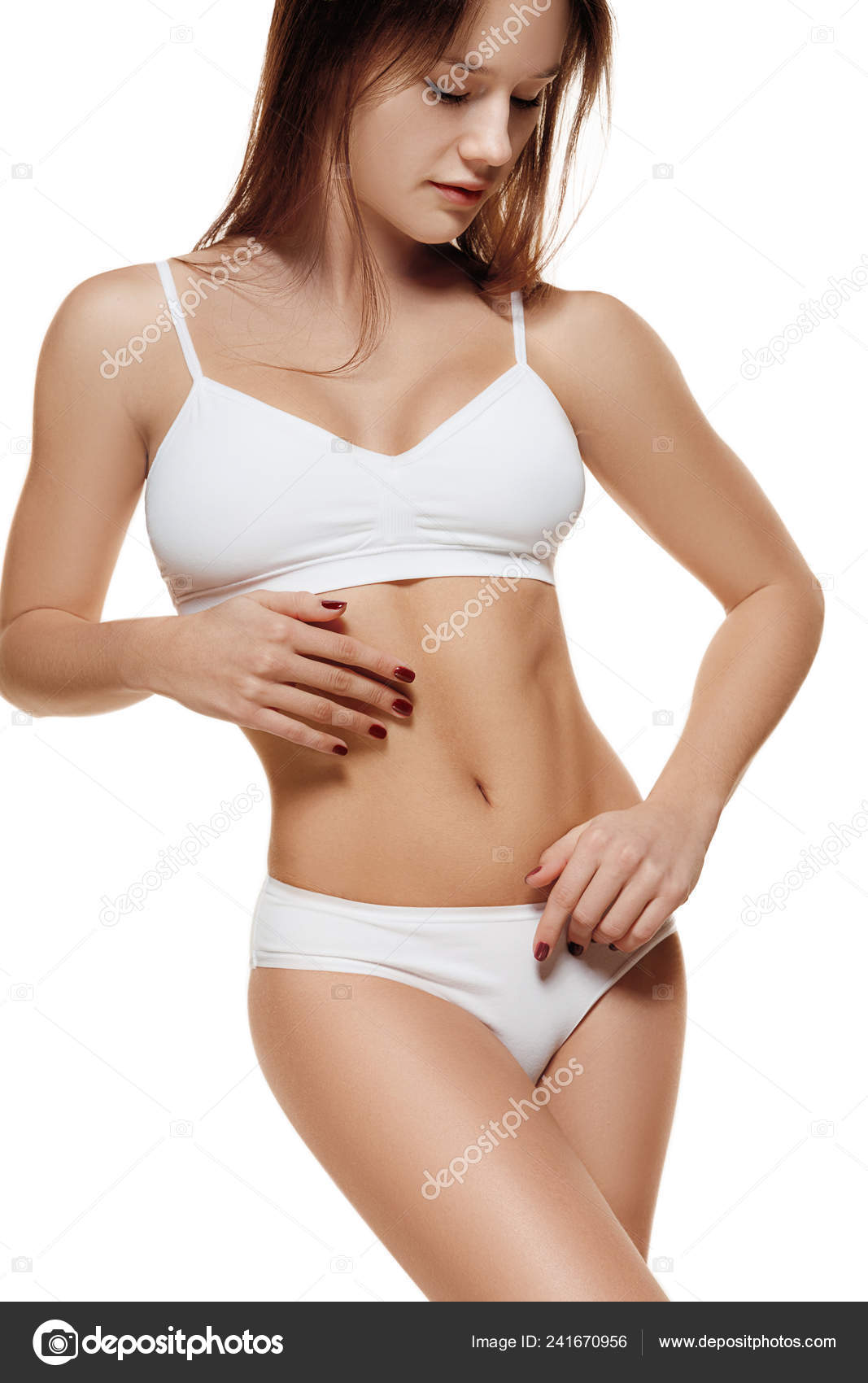 Perfect slim toned young body of the girl . Stock Photo by  ©vova130555@gmail.com 241670956