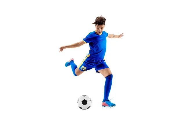 Young boy with soccer ball doing flying kick — Stock Photo, Image