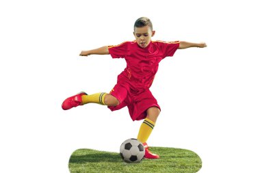 Young boy kicks the soccer ball clipart