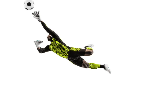 Один футболист вратарь ловит мяч. — стоковое фото