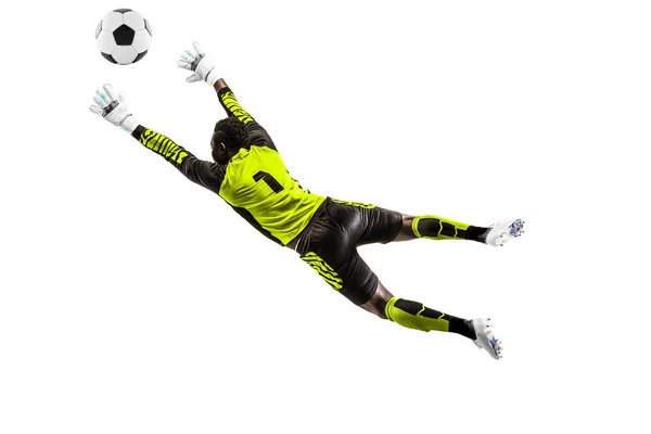 Um jogador de futebol goleiro homem captura bola — Fotografia de Stock