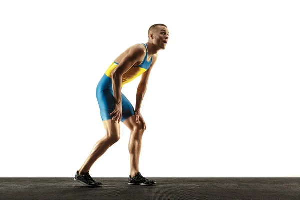 Young caucasian man running or jogging isolated on white studio background. — Stock Photo, Image