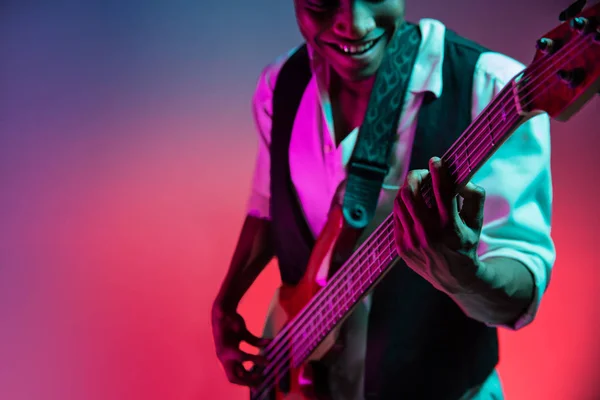 African American jazz musician playing bass guitar. — Stock Photo, Image