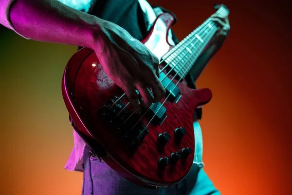 African American jazz musician playing bass guitar. — Stock Photo, Image