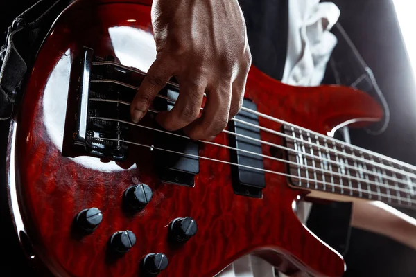 African American jazz musician playing bass guitar. — Stock Photo, Image