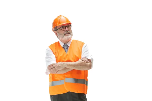 O construtor em capacete laranja isolado em branco — Fotografia de Stock