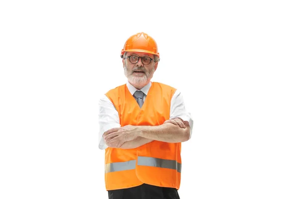 O construtor em capacete laranja isolado em branco — Fotografia de Stock