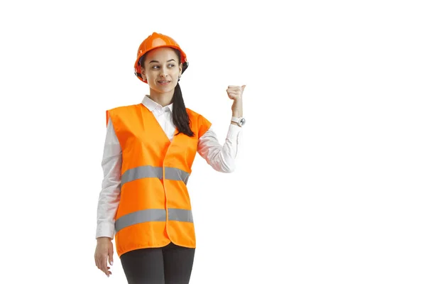 La constructora femenina en casco naranja aislado en blanco —  Fotos de Stock