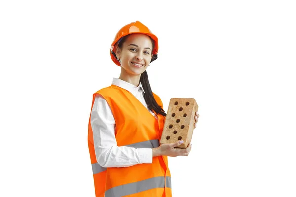 La constructora femenina en casco naranja aislado en blanco —  Fotos de Stock