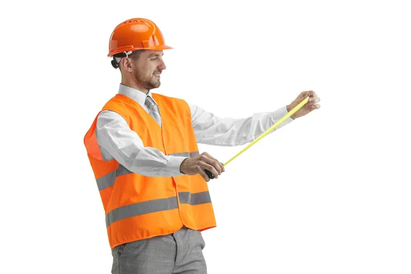 El constructor en casco naranja aislado en blanco —  Fotos de Stock