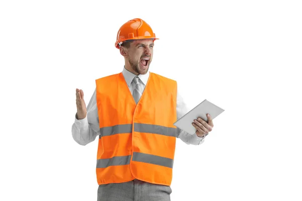 Будівельник в помаранчевому шоломі ізольований на білому — стокове фото