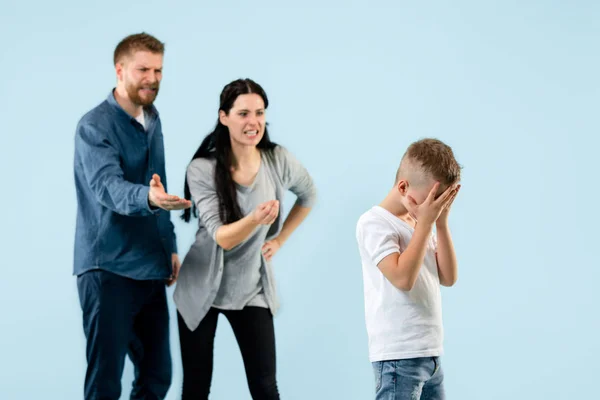 Angry parents scolding their son at home — Stock Photo, Image