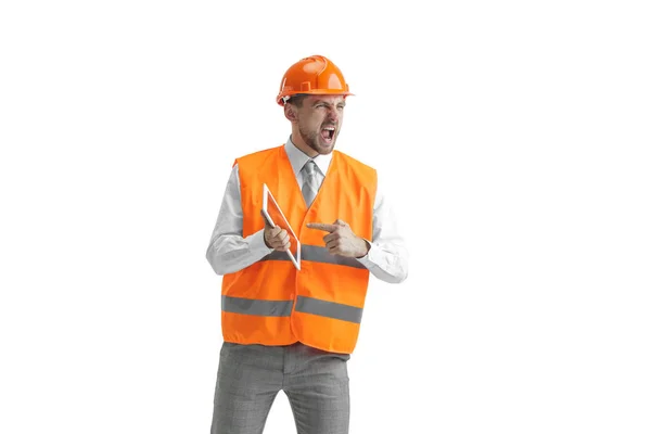 O construtor em capacete laranja isolado em branco — Fotografia de Stock