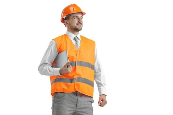 O construtor em capacete laranja isolado em branco — Fotografia de Stock