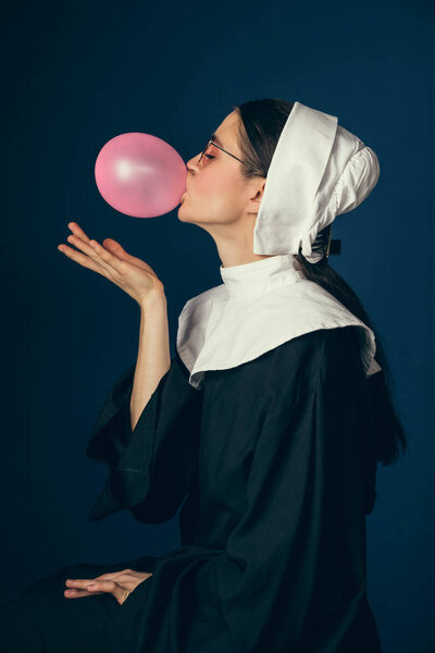 Medieval young woman as a nun