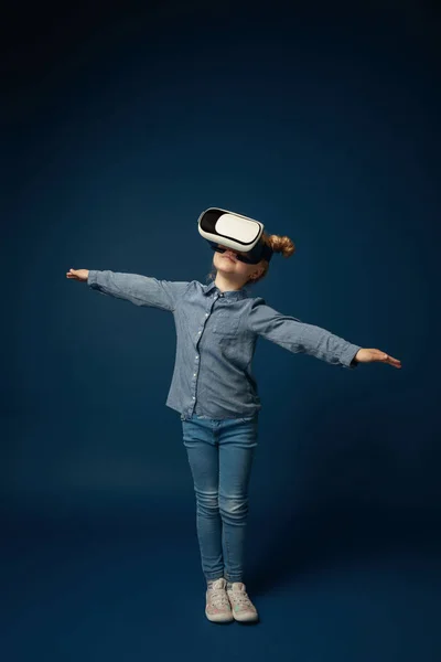 Child with virtual reality headset