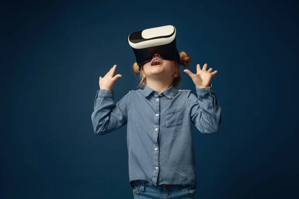 Child with virtual reality headset