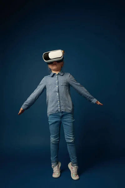 Child with virtual reality headset