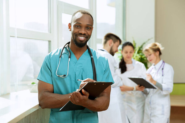 Healthcare people group. Professional doctors working in hospital office or clinic