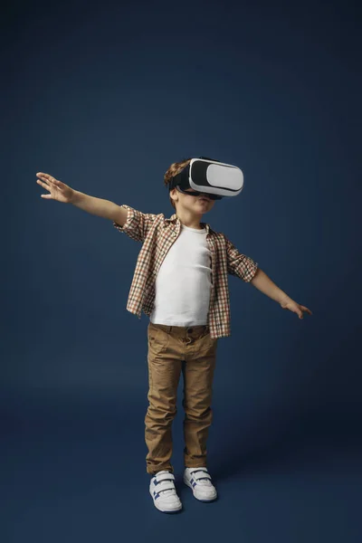 Child with virtual reality headset