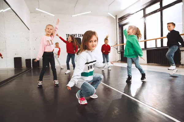 The kids at dance school. Ballet, hiphop, street, funky and modern dancers