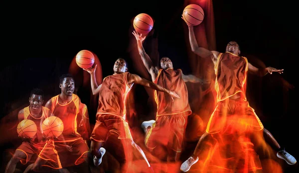 Poster Basketball ball in fire flames and splashing water 