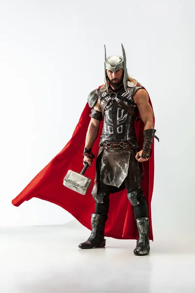 Man in cosplaying Thor isolated on white studio background — Stock Photo, Image