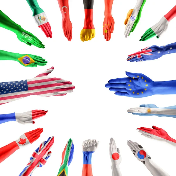 Handen gekleurd in vlaggen van deelnemende landen van de groep van twintig — Stockfoto