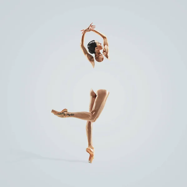 Ba -lerin. Genç zarif kadın bale dansçısı gri stüdyo üzerinde dans. Klasik balenin güzelliği. — Stok fotoğraf