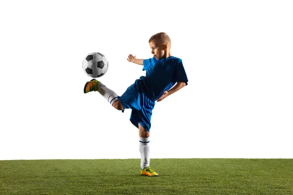 Jonge jongen als voetbal of voetbalspeler op witte studio achtergrond — Stockfoto