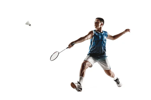 Kleiner Junge spielt Badminton isoliert auf weißem Studiohintergrund — Stockfoto