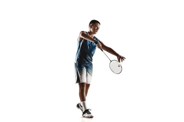 Kleiner Junge spielt Badminton isoliert auf weißem Studiohintergrund — Stockfoto