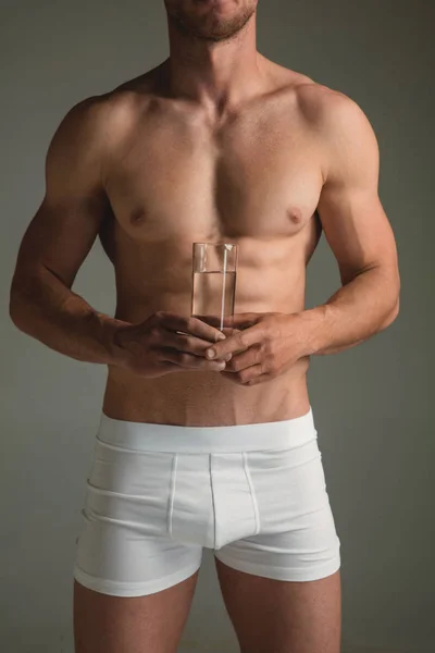 Perfeito corpo jovem magro tonificado do homem — Fotografia de Stock