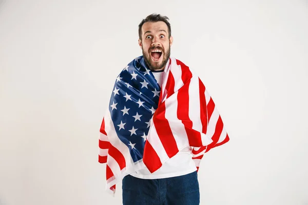 Young man with the flag of United States of America — Stock Photo, Image