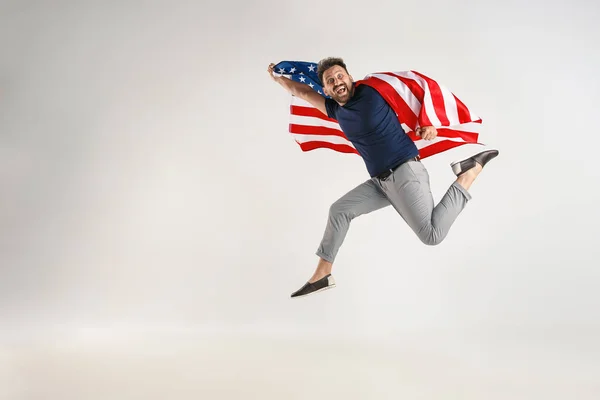 Young man with the flag of United States of America — Stock Photo, Image