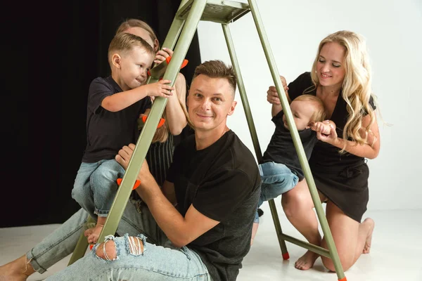 Young family spending time together and smiling — Stock Photo, Image