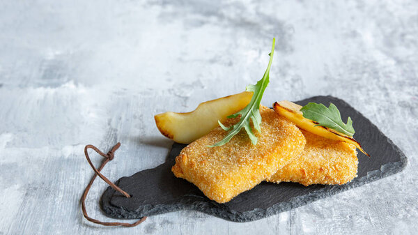 Close up photo of meat snacks on stone background