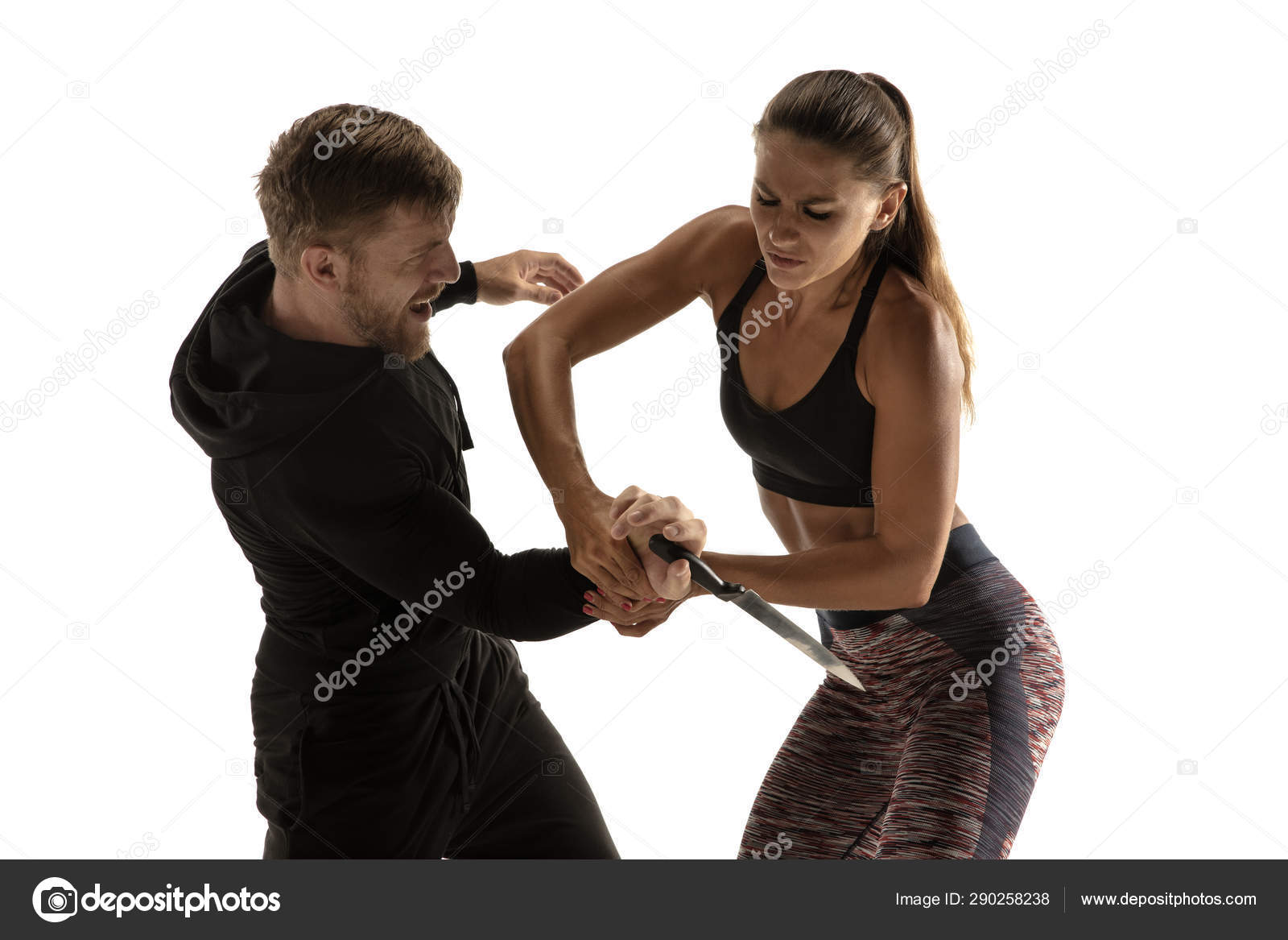 Man And Woman Fighting In Studio Womens Self Defense Concept