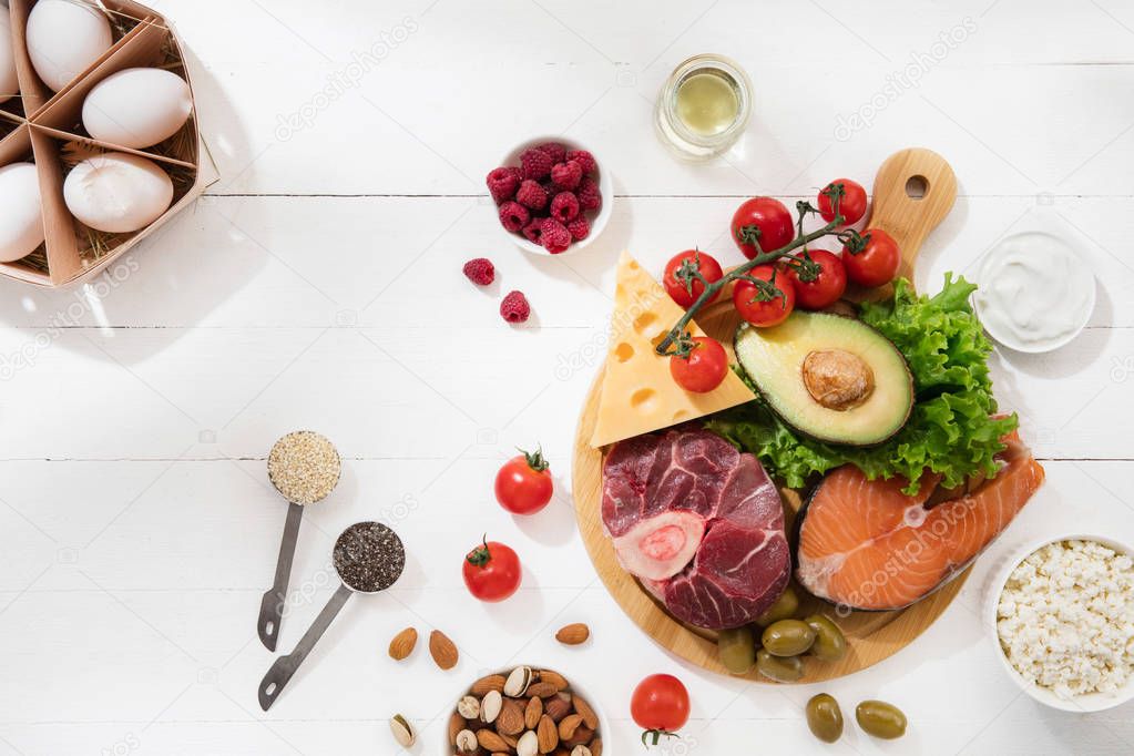 Ketogenic low carbs diet - food selection on white background