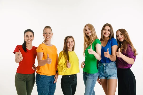 Unga kvinnor weared i hbt flagga färger isolerade på vit bakgrund, HBT Pride Concept — Stockfoto