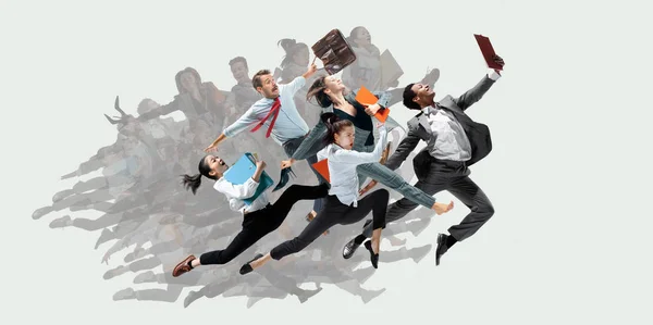 Office worker s or ballet dancers jumping on white background — Stock Photo, Image